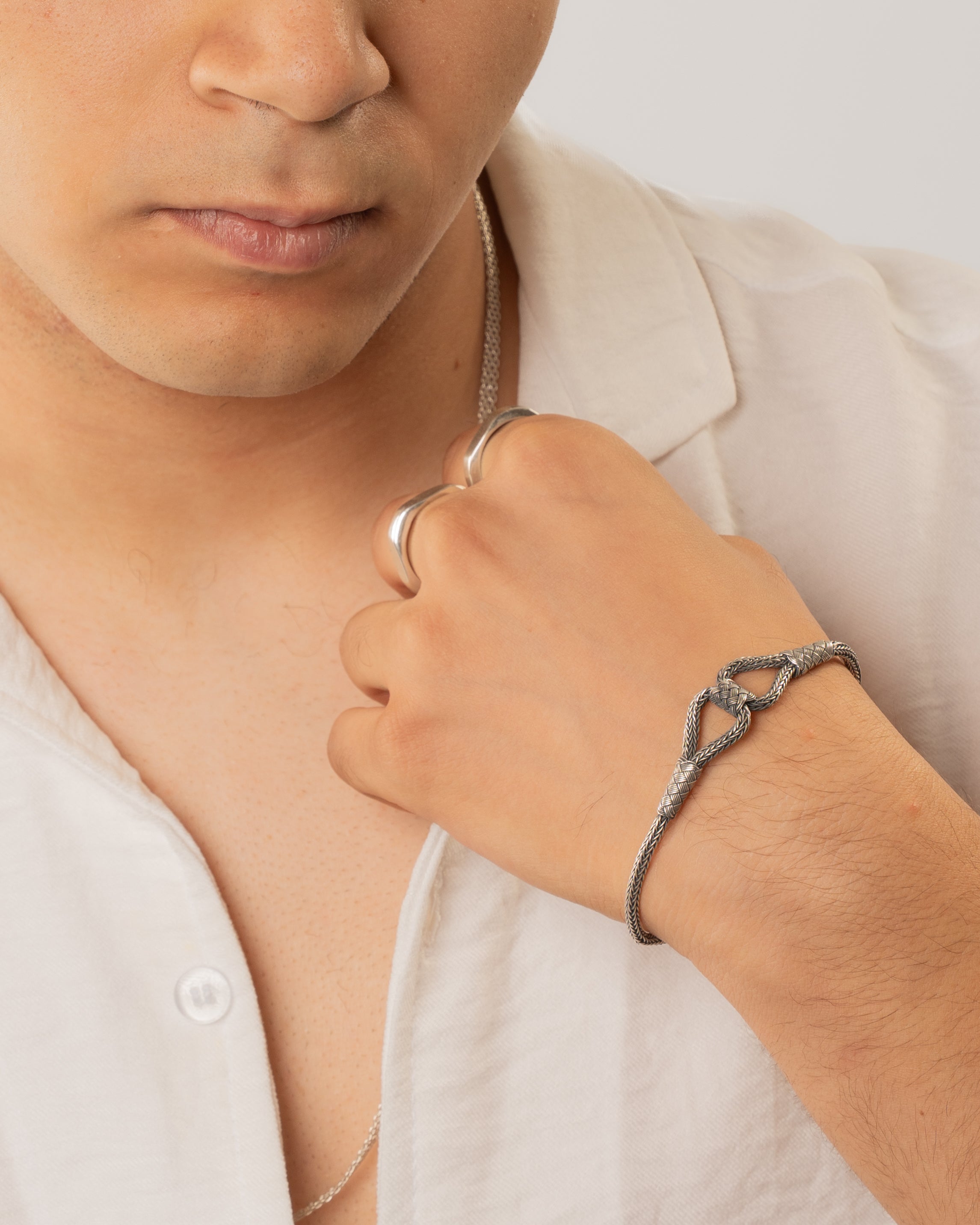 Silver Wheat Chain Bracelet with Interlocking Knot - Image 3