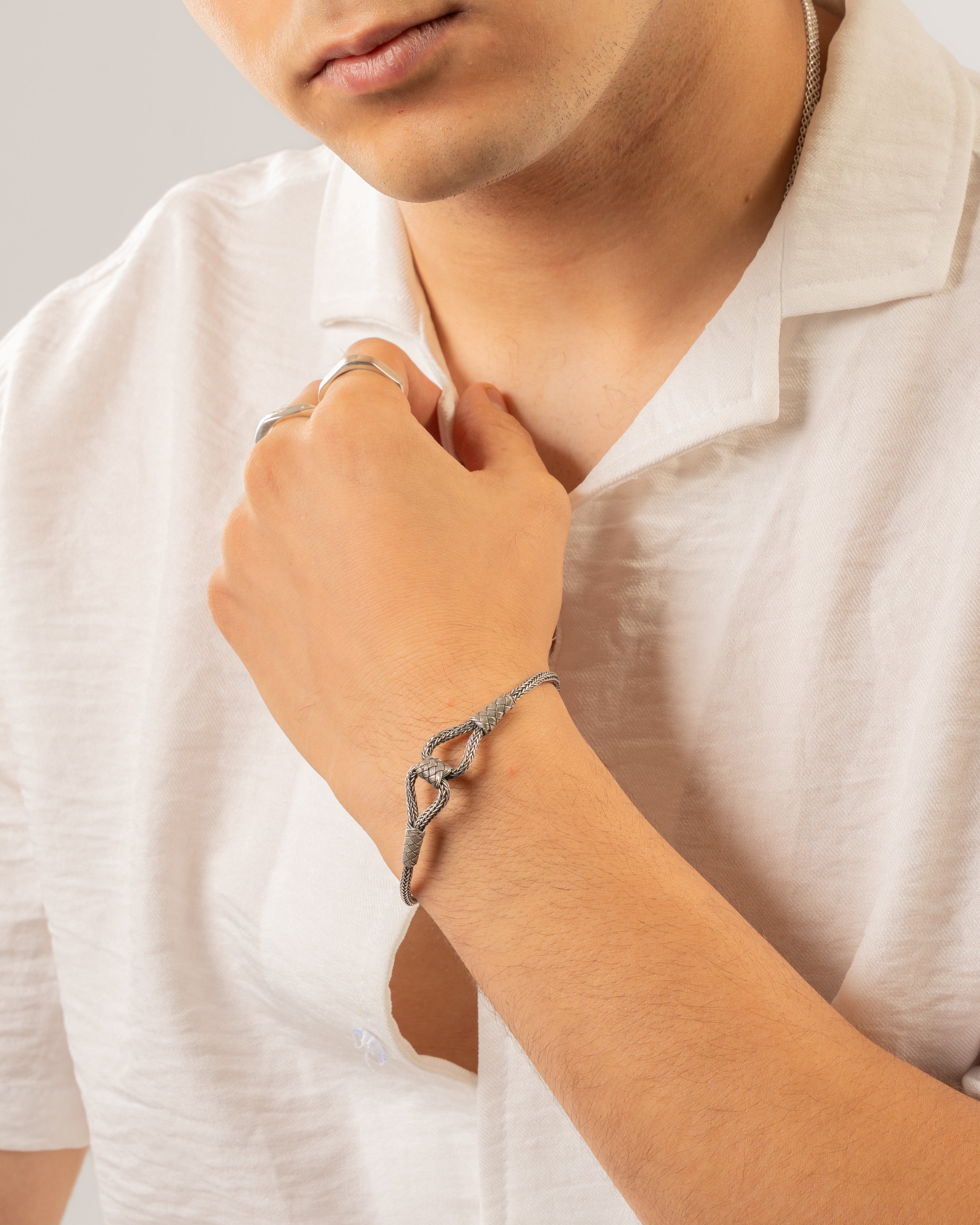 Silver Wheat Chain Bracelet with Interlocking Knot - Image 4